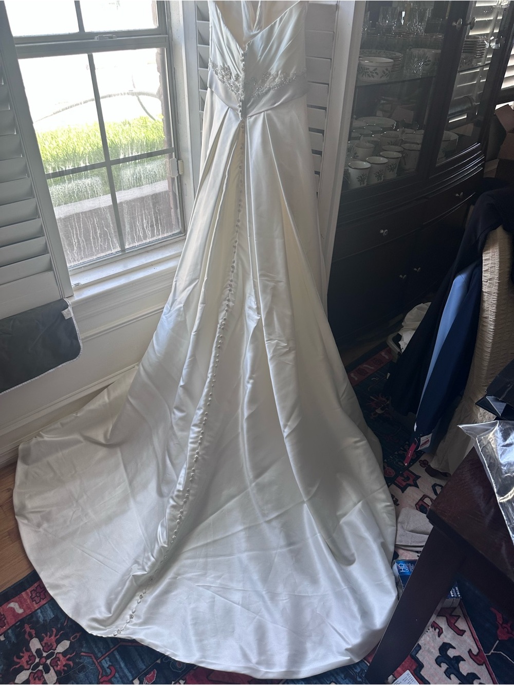Elegant White Satin Wedding Gown with Button-Back Train